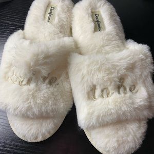 Never worn- white faux fur “Bride to be” slippers, never worn, no tags size 8!